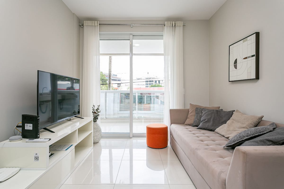 Sala do apartamento em Jurerê